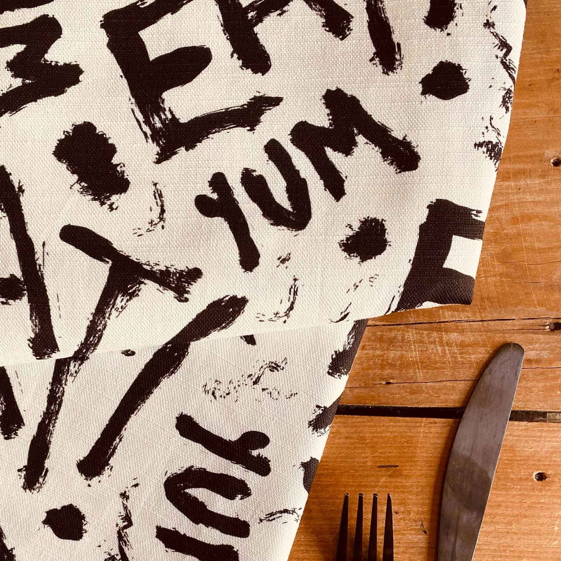 Black and white I Love Food Designer Tablecloth For Entertaining By Brisbane Artist Sheridan Eveline